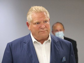 Ontario Premier Doug Ford, seen here taking questions during a press conference at Timmins and District Hospital when he was in Timmins earlier this month, announced tentative plans to lift all COVID-19 public health measures by the end of March.

ANDREW AUTIO/The Daily Press
