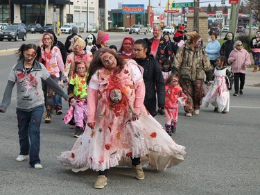 Saturday's zombie walk started at Hollinger Park and made its way to downtown Timmins.

ANDREW AUTIO/The Daily Press