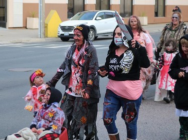 The zombie walk on Saturday attracted a wide range of participants, including small children.

ANDREW AUTIO/The Daily Press