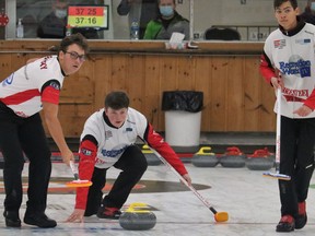 Second Matt Duizer, flanked by Jackson Dubinsky and Brayden Sinclair of Team Burgess out of the Kakabeka Falls Curling Club, throws a rock during Friday afternoon action at the Under-21 Northern Ontario Curling Championship being hosted by the McIntyre Curling Club. Action continues until Sunday.

ANDREW AUTIO/The Daily Press