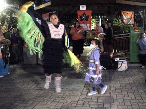 Nikki Shawana from Waterford and her daughter Ziibi danced at the March for Reconciliation and Truth gathering in Ingersoll on Sept. 30. (Chris Abbott/Norfolk and Tillsonburg News)