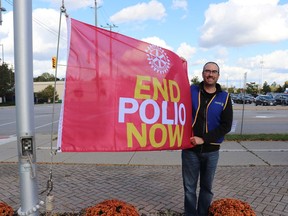 To recognize World Polio Day on Oct. 24, the Rotary Club of Tillsonburg has raised an End Polio Now flag at the Rotary Clock Tower. Shown is Jason Weiler, president of the Rotary Club of Tillsonburg. Submitted