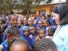 Shelley Green, right, from Mothers with a Heart for Ethiopia, meets children in Ethiopia. (Submitted)