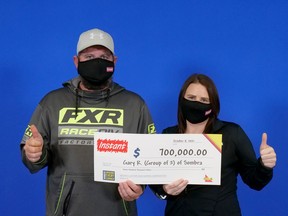 Gary Rankin and Ashley Bird of Sombra won $700,000 playing the Ontario Lottery and Gaming Corporation's Instant Supreme 7 game. Handout