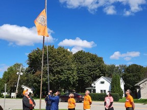 The raising of the Every Child Matters flag. Among those in the photo are, from left: Mayor Bob Purcell, Chief Adrian Chrisjohn, MP Karen Vecchio, Deputy Warden Dave Mennill, representative of MPP Jeff Yurek, Delaney Leitch. Victoria Acres