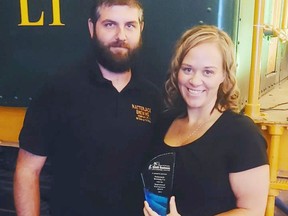Dan Soos and Rachael Kalita-Soos pose with the Inspirational Business Award they received on behalf of Natterjack Brewing Company. Natterjack Brewing Company photo