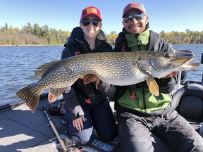 Shelby and Jeff Gustafson with a nice pike from Lake of the Woods over the past weekend.