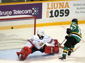 Luke Evangelista beats Corbin Votary on a breakaway to open the scoring in the first period Wednesday night as the Owen Sound Attack host the London Knights inside the Harry Lumley Bayshore Community Centre. Greg Cowan/The Sun Times