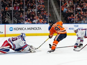 Edmonton Oilers’ Connor McDavid scores a late-game goal on New York Rangers’ goaltender Alexandar Georgiev on Friday, Nov. 5, 2021. Photo by Ian Kucerak/Postmedia.