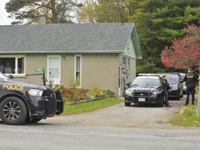 Members of the Ontario Provincial Police were stationed outside the home of Norfolk gunsmith Rodger Kotanko, 70, of Port Ryerse Road west of Port Dover Thursday morning. Friends, neighbours and a witness report Kotanko was shot Wednesday as members of the Toronto Police Service executed a firearms search warrant at his home.