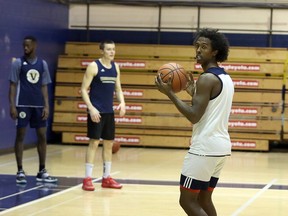 Laurentian Voyageurs guard Haroun Mohamed, right, takes part in a practice in the Ben Avery Gym in Sudbury, Ontario on Wednesday, November 3, 2021.