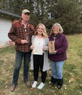 Parkland County's Meagan Chapman, centre, is joined by her parents after she received the province's first Spirit Award, presented as part of the 2021 Minister's Seniors Service Awards, given to individuals, organizations or businesses for their service to seniors in Alberta.