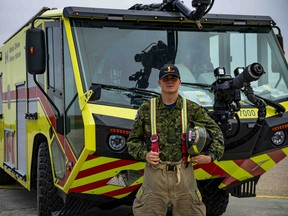Cpl. Kristofer Faucon poses for a photo in front of a firetruck at Mihail Kogalniceanu Air Base during Operation Reassurance Air Task Force - Romania, Oct.9. 

Photo by: Aviator Avery Philpott, 4 Wing Imaging