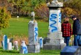 A $5,000 reward is being offered as Belleville Police Service steps up criminal investigation into the desecration of 425 grave markers at two Belleville cemeteries in recent days. DEREK BALDWIN