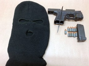 A handgun, ammunition and a black balaclava were found by Ontario Provincial Police in a vehicle on Sunday morning on Highway 401 in Kingston.