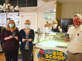 With coupons from over 200 local businesses and the opportunity for thousands of dollars of savings, Simple Dreams Ministries, Stratford House of Blessing and the Kiwanis Club of Stratford launched their annual Passport to Savings fundraiser Saturday during a launch event with free ice cream at Stratford Home Furniture. Pictured from left are House of Blessing executive director Theresa McMurray, Kiwanis member Barb Muir, Simple Dreams founder Richard Kneider and Stratford Home Furniture owner Jim Fierling. Galen Simmons/The Beacon Herald/Postmedia Network