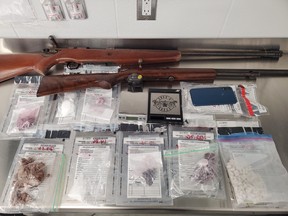 The OPP seized approximately $113,000 in drugs, along with stolen firearms, bicycles and three cellphones during while executing a warrant in Sturgeon Falls. Two people were charged.