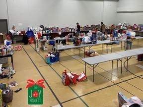 Staff and volunteers with the Children’s Aid Society of the District of Nipissing and Parry Sound sort gifts and donations last year in preparation for the 2020 Joy Project.

Submitted Photo