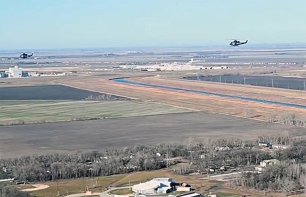 Choppers fly over Dakota Tipi and Long Plain for National Indigenous Veterans Day Driving