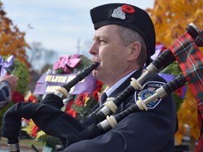 Sgt. Ron Taylor, a bagpiper with the St. Thomas Police Pipes and Drums, said he found it "very moving" to play Thursday at the Remembrance Day ceremony at Veterans Memorial Gardens in St. Thomas. (CALVI LEON, Postmedia Network)