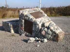 A large stone monument that speaks to the origins of Monetville was found wrenched from its base on Monday. Police are asking for information from the public regarding the act of mischief.