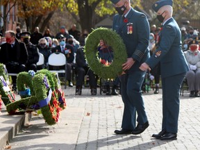 22 Wing commander Col. Mark Lachapelle and Chief Warrant Officer Debbie Martens lay a wreathe, Thursday, at the North Bay cenotaph during Remembrance Day services.
PJ Wilson/The Nugget