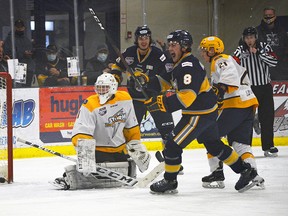 Spruce Grove Saints defenceman, Will Holland (#8) reacts to scoring his first AJHL goal Saturday night at the Grant Fuhr Arena. The Saints hot winning streak continued as they downed the Grande Prairie Storm 6-5 for their ninth consecutive win. Kristine Jean.