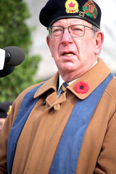 Remembrance Day service at cenotaph on Queen Street East on Thursday, Nov. 11, 2021 in Sault Ste. Marie, Ont.  Padre Phil Miller, of Royal Canadian Legion Branch 25, recites In Flanders Fields. (BRIAN KELLY/THE SAULT STAR/POSTMEDIA NETWORK)