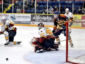 Timmins Rock goalie Gavin McCarthy makes one of his 19 saves during second-period action at the Joe Mavrinac Community Complex Thursday night. McCarthy recorded his first shutout of the season and earned his 10th victory of the campaign as the Rock blanked the Kirkland Lake Gold Miners 5-0. The Rock will travel to Cochrane for a game against the Crunch at the Tim Horton Event Centre on Friday, at 8 p.m. ALLYSON DEMERS/FOR NOJHL NETWORK