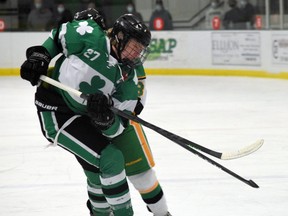 Brayden Dwyer takes a check in the Nov. 6 match against Thamesford.