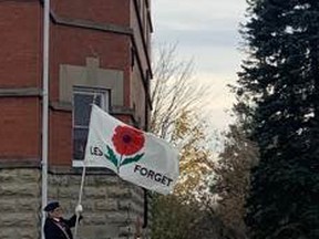 "Lest We Forget" reads a flag at the November 11 Cenotaph service. Hannah MacLeod/Lucknow Sentinel