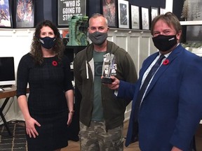 Last year, Huron Chamber of Commerce board member, Nadine VandenHeuvel, presents the Huron Chamber of Commerce Business of the Year Award 2020 to Mark Hussey of FauxPop Media, while Mayor Goderich Grace looks on. Submitted