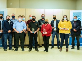 Handout/Cornwall Standard-Freeholder/Postmedia Network
South Dundas recognized the eight recipients of its third-annual Awards of Excellence prior to the council meeting on Nov. 15, 2021. They're pictured here with members of council and staff.