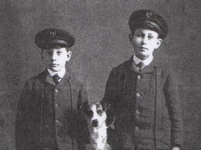 Alexander Sutherland and John Angus "Gus" MacLeod with their dog, "Sport". Both Ripley men went to serve in World War 1, with only Gus returning to run the Ripley Post-office.