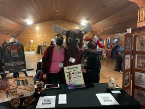 The Kincardine Theatre Guild (KTG) had a booth at the Arts Ignight celebration, where they were promoting their upcoming play "Buying the Moose". L-R: Sarah Foster, who plays Betty, Andy Wasylycia (dressed as moose), who is a stage manager and Deb Deckert, who will be a "Covid cop". Hannah MacLeod/Kincardine News
