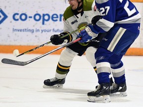 Paul Christopoulos of the North Bay Battalion vies for position with rookie Quentin Musty of the visiting Sudbury Wolves in the Troops' 4-0 Ontario Hockey League win Sunday. The Battalion hosts the Ottawa 67's at 7 p.m. Thursday.
Sean Ryan Photo