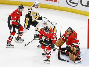 Nov 9, 2021; Chicago, Illinois, USA; Chicago Blackhawks goaltender Marc-Andre Fleury (29) defends against the Pittsburgh Penguins during the third period at United Center. Mandatory Credit: Kamil Krzaczynski-USA TODAY Sports