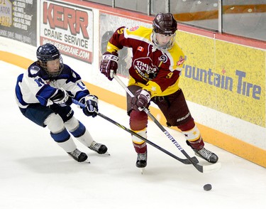 Connor Desbois, of the Sudbury U16 Nickel Capitals, and Raymond Durocher, of the Majors, battle for the puck behind the Timmins net during the first period of Saturday night’s Great North U18 League contest at the McIntyre Arena. The U16 Nickel Capitals went on to defeat the Majors 5-2. The Majors will host the Sault Ste. Marie U18 Greyhounds at the McIntyre Arena on Sunday, at 11 a.m. THOMAS PERRY/THE DAILY PRESS