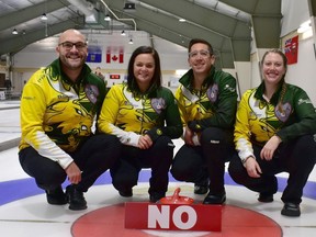 Amanda Gates, far right, and the Fort William Curling Club-based mixed team of Trevor Bonot (skip), Jackie McCormick (vice) and Mike McCarville (second).