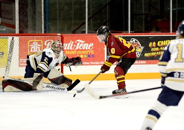 Timmins Rock forward Christopher Engelbert gains control of the puck in front of the Kirkland Lake net prior to roofing a shot up and over Gold Miners goalie Keaton Lyons for a shorthand goal during Sunday afternoon’s NOJHL game at the McIntyre Arena. Engelbert’s seventh goal of the season gave the Rock a 4-1 lead in a game they would go on to win 5-2. THOMAS PERRY/THE DAILY PRESS