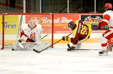 Timmins Majors forward Nathan Dutkiewicz manages to get off an off-balance shot on this second-period breakaway but he was unable to beat Sault Ste. Marie U18 Greyhounds goalie Charlie Burns on the play. The U18 Greyhounds staged a third-period rally to defeat the Majors 3-2. THOMAS PERRY/THE DAILY PRESS