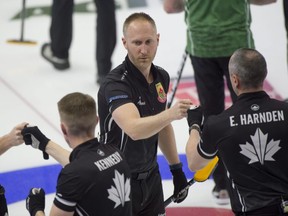 Brad Jacobs, 3rd.Marc Kennedy, 2nd. E.J.Harnden, lead Ryan Harnden celebrate after their 7-6 win over Team Dunstone at the Canadian Olympic Curling Trials in Saskatoon on Sunday afternoon.
