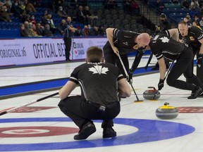 Skip Brad Jacobs of Sault Ste Marie follows his front end (L-R) lead Ryan Harnden, 2nd.E.J.Harnden into the house (3rd.Marc Kennedy) during draw 6 against team Bottcher.The Jacobs rink improved to 3-0 with a 5-2 win over Team Bottcher on Monday afternoon.