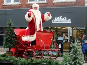 Santa Claus waves to the crowd, Sunday, in the North Bay Santa Claus Parade. The parade was cancelled last year because of the COVID-19 pandemic.
PJ Wilson/The Nugget