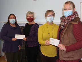 Taking part in the donation of the proceeds from the Zion Lutheran Church garage sale to Bernadette McCann House and the Robbie Dean Family Counselling Centre were, from left, LeeAnn Gagnon, residential supervisor at Bernadette McCann House, Ellen Vandersleen, church garage sale representative, Susan Dupuis, church council chairwoman, and Monique Yashinskie, executive director of the Robbie Dean Centre. Both organizations received $1,324.63. Anthony Dixon