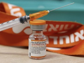 A vial of the Pfizer/BioNTech COVID-19 vaccine for children. As of 11:30 a.m. Wednesday, 42,860 appointments were booked for pediatric doses in Alberta. JACK GUEZ