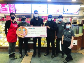 The Devon Tim Hortons recently made a donation to the Devon Christmas Elves campaign. (Supplied by Devon Christmas Elves)