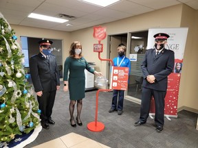 The 2021 Salvation Army Kettle Campaign began on Nov. 18 at the Royal Bank in High River, where a first donation ceremony took place.