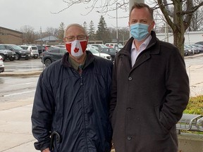 Jeff Yurek, MPP for Elgin-Middlesex-London, with trustee Bill Hall, announced a provincial investment of $4.9 million for an addition at St. Anne's Catholic elementary school (HEATHER RIVERS, The London Free Press)