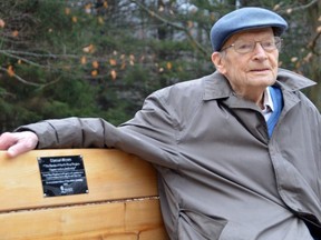 Elwood Moore sits in the trees of the world section of the arboretum at the Grey Sauble Conservation Authority on Thursday, November 25, 2021, on a bench that was dedicated in his honour marking his 100th birthday and his decades of service to conservation in the area.